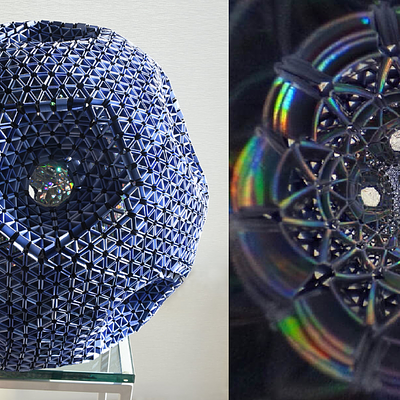 Big Boy Blue (2020), snapology origami sculpture of an eleven-holed torus from by David Honda.